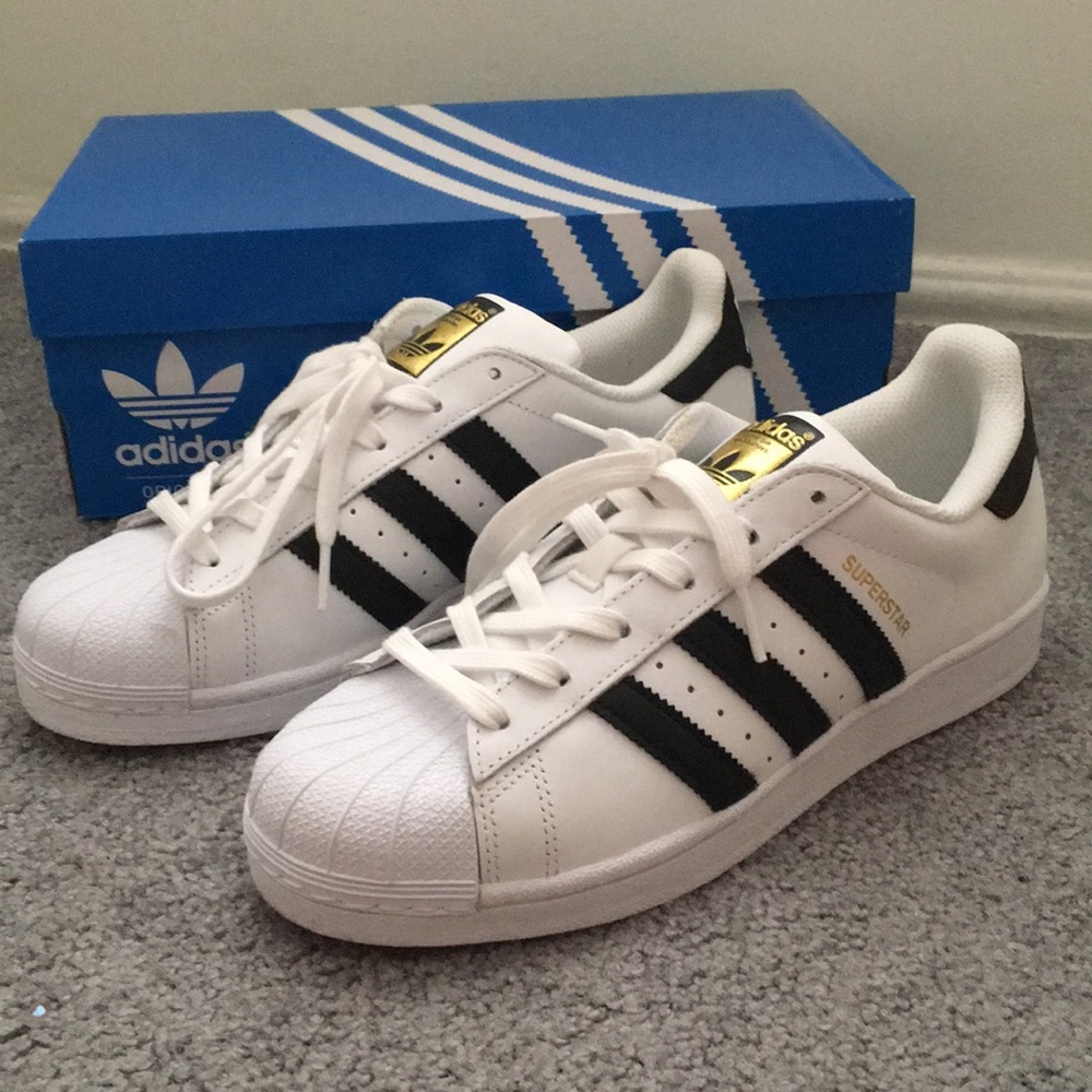 White Adidas Originals Superstar Fashion Sneakers.